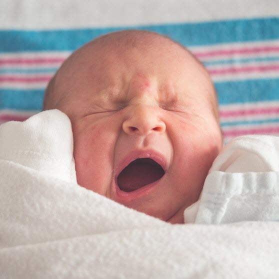 Image of baby yawning on a compounding pharmacy website in Dayton, Ohio.